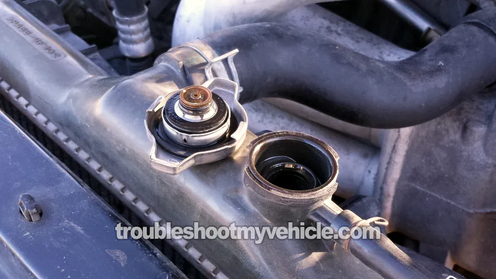 Coolant Shooting Out From Open Radiator. How To Test For A Blown Head Gasket (1993, 1994, 1995, 1996, 1997, 1998, 1999, 2000, 2001, 2002, 2003, 2004, 2005, 2006, 2007, 2008 1.8L Toyota Corolla)