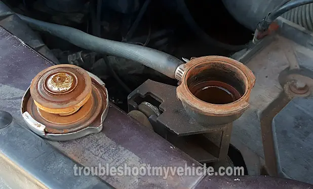 Exhaust Gases Shooting Out Of The Radiator. How To Test For A Blown Head Gasket (1991, 1992, 1993, 1994, 1995 2.5L Dodge Caravan And Plymouth Voyager)